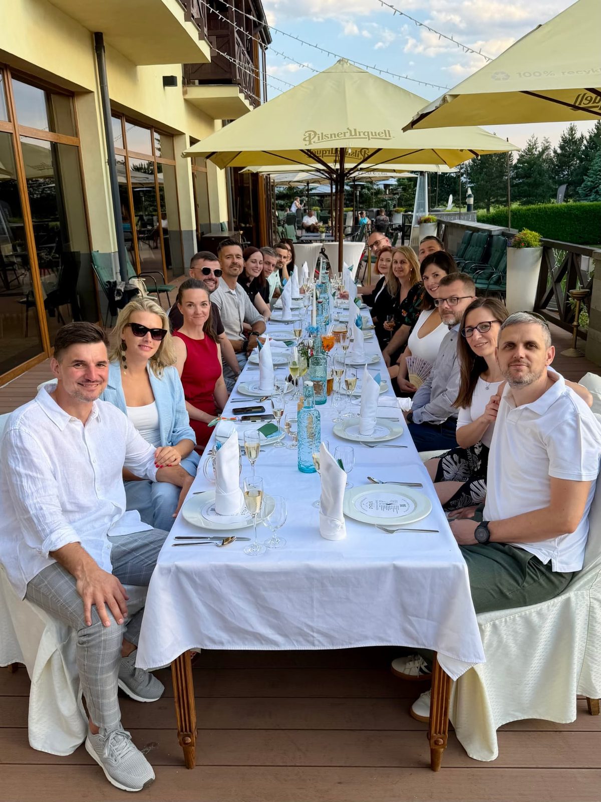 The MNB Solutions team gathered around the anniversary dinner table